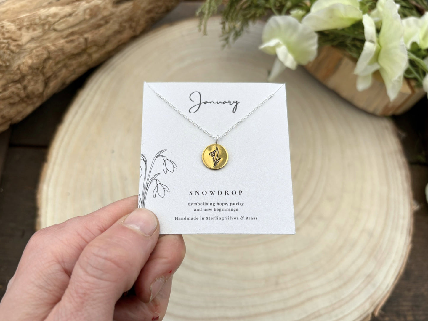 Gold January birth flower necklace, snowdrop by Curious Magpie Jewellery