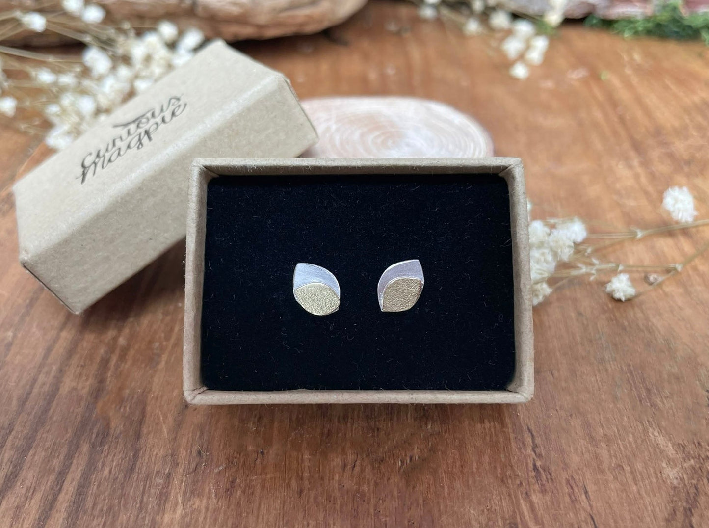 Gold and Silver Leaf Duo Stud Earrings by Curious Magpie Jewellery