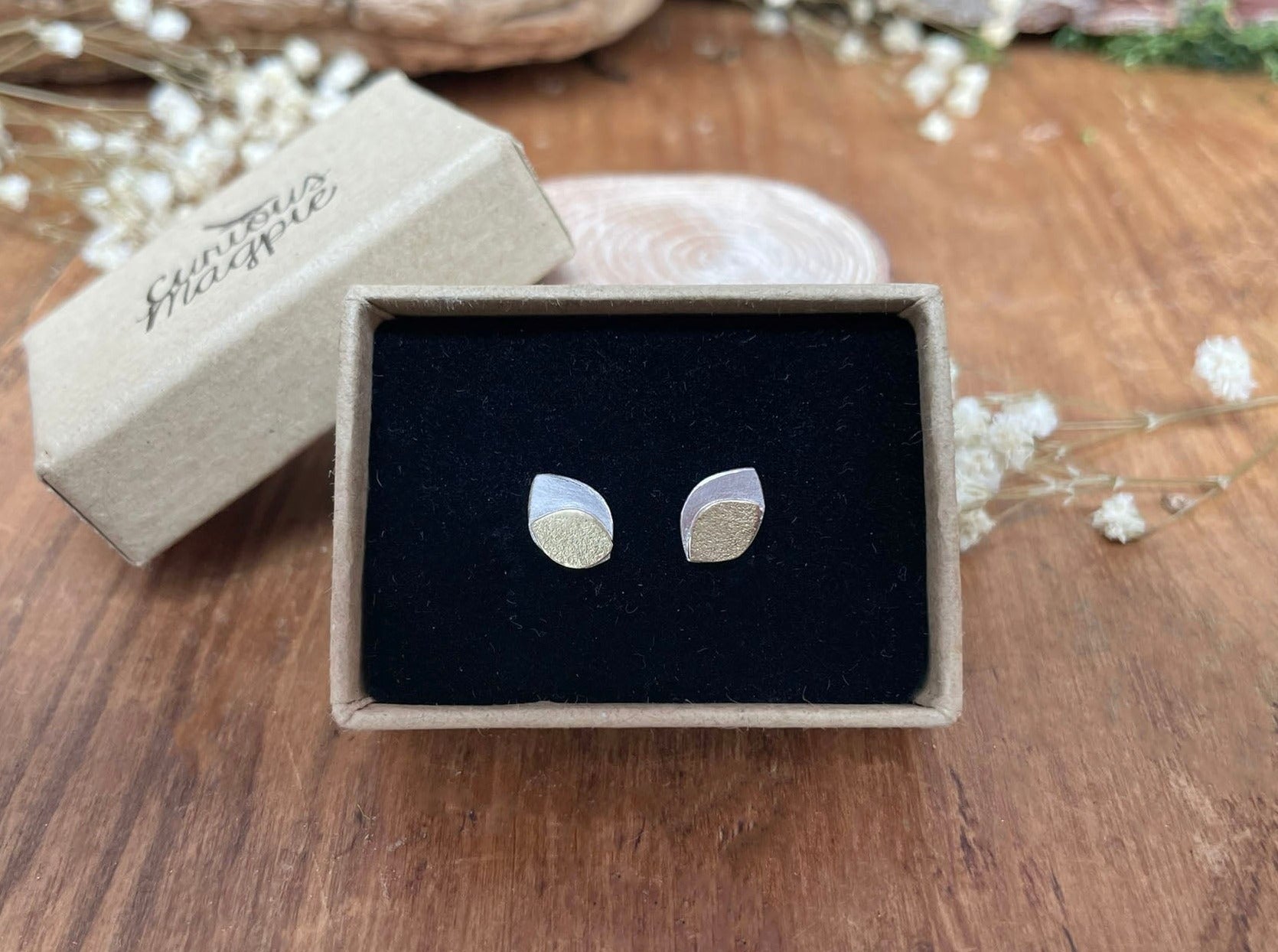 Gold and Silver Leaf Duo Stud Earrings by Curious Magpie Jewellery