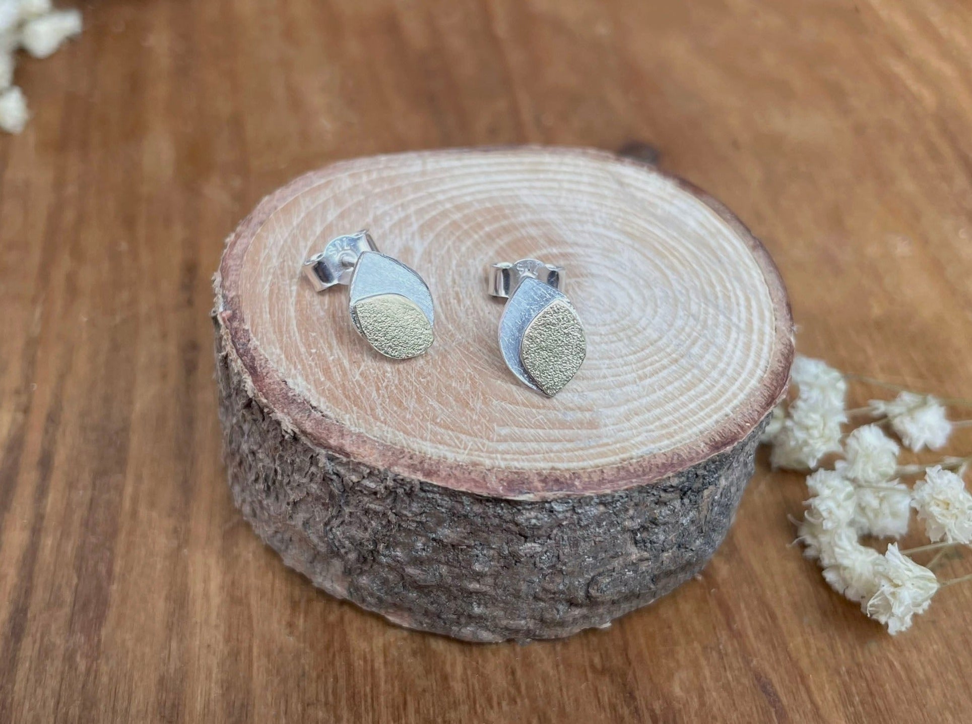 Gold and Silver Leaf Duo Stud Earrings by Curious Magpie Jewellery