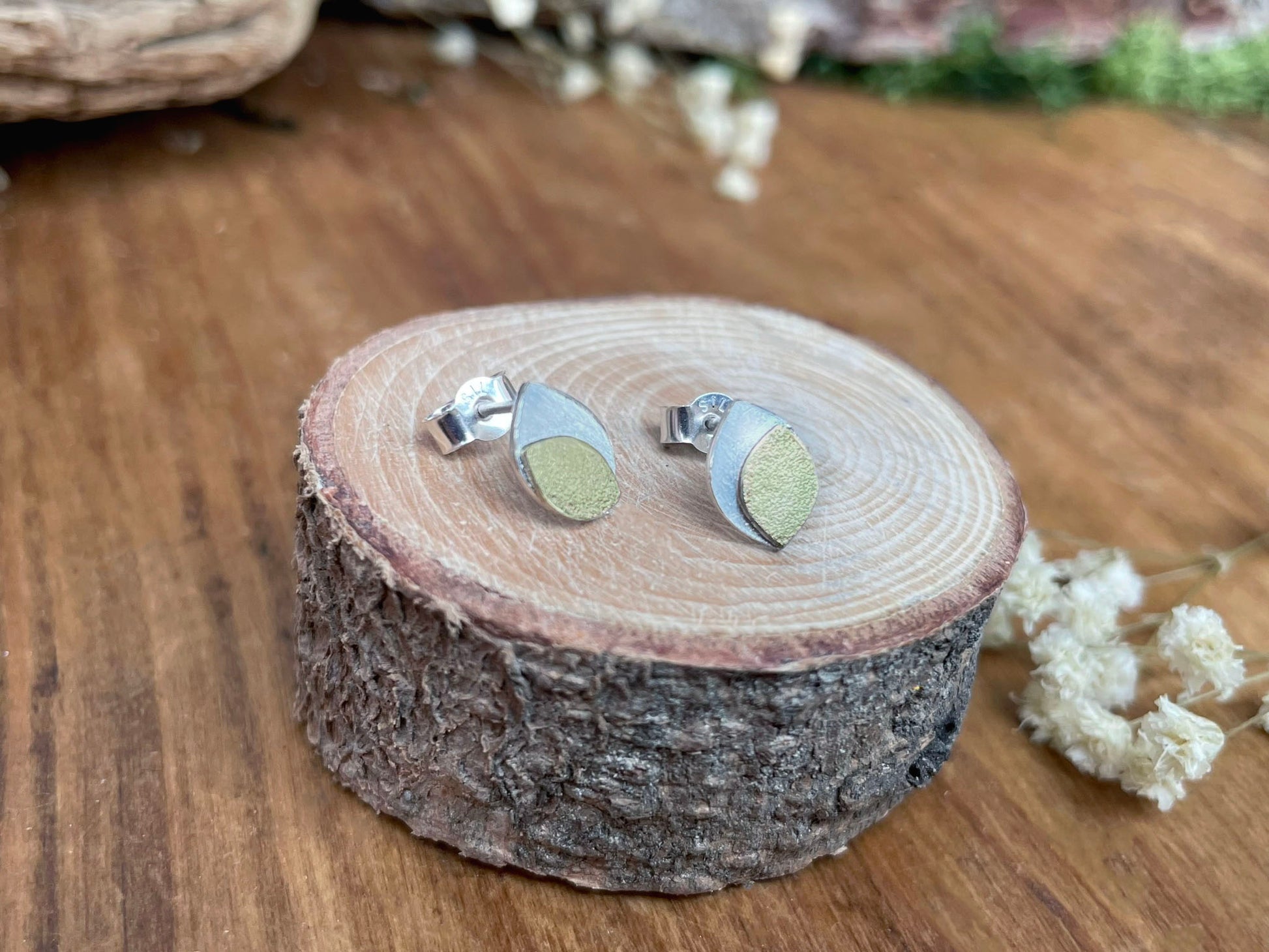Gold and Silver Leaf Duo Stud Earrings by Curious Magpie Jewellery