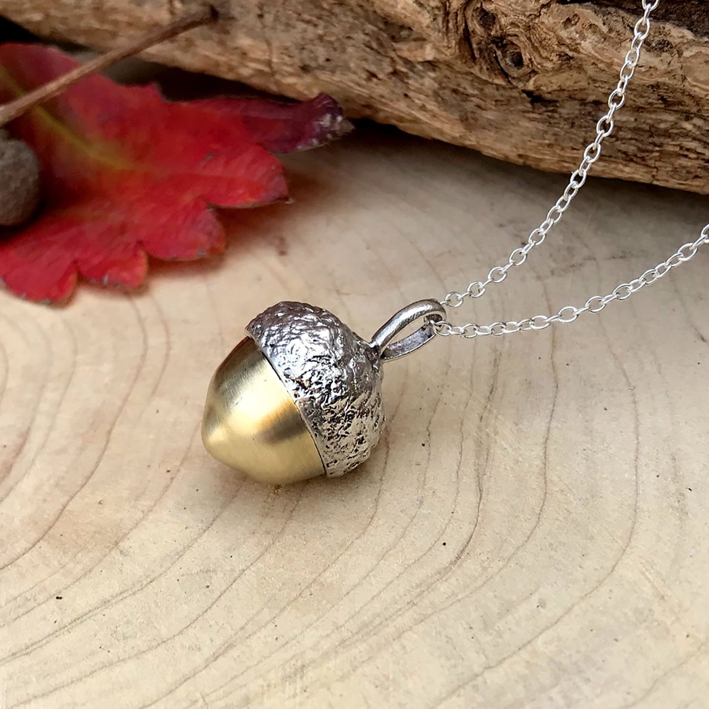 Chunky Silver and Brass Acorn Necklace by Curious Magpie