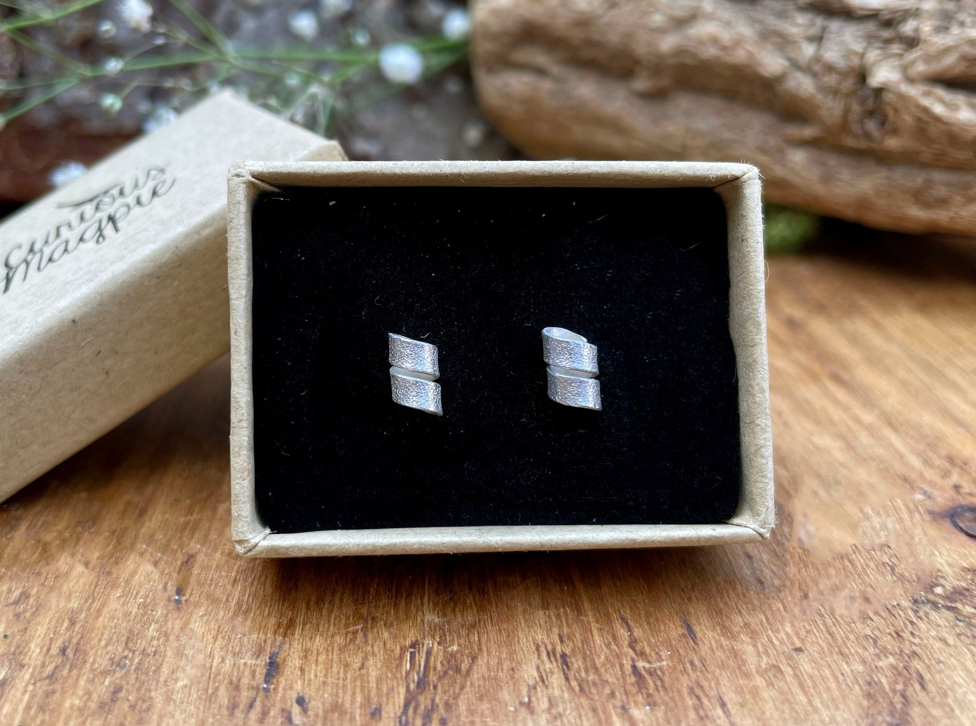 Silver Petal Twist Stud Earrings by Curious Magpie Jewellery