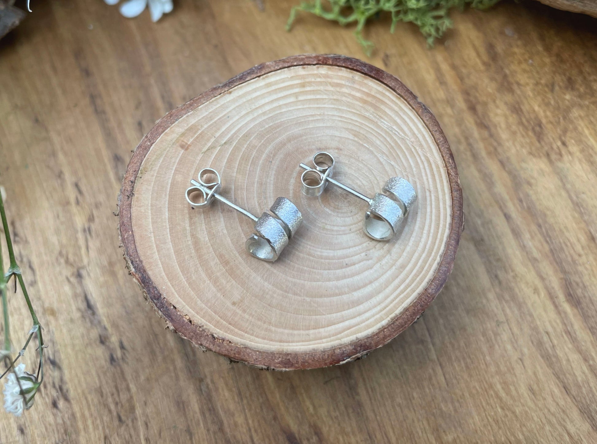 Silver Petal Twist Stud Earrings by Curious Magpie Jewellery