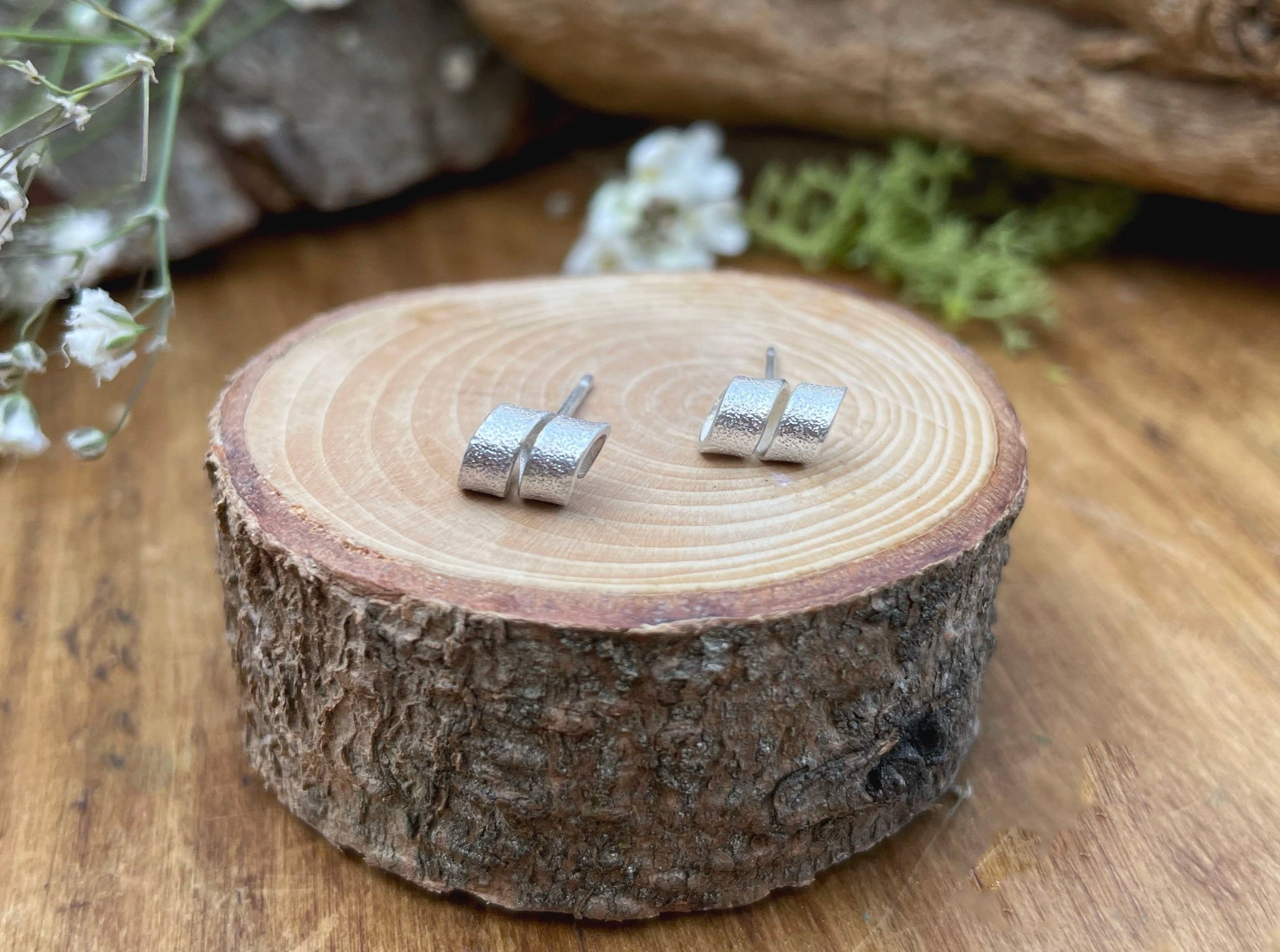 Silver Petal Twist Stud Earrings by Curious Magpie Jewellery
