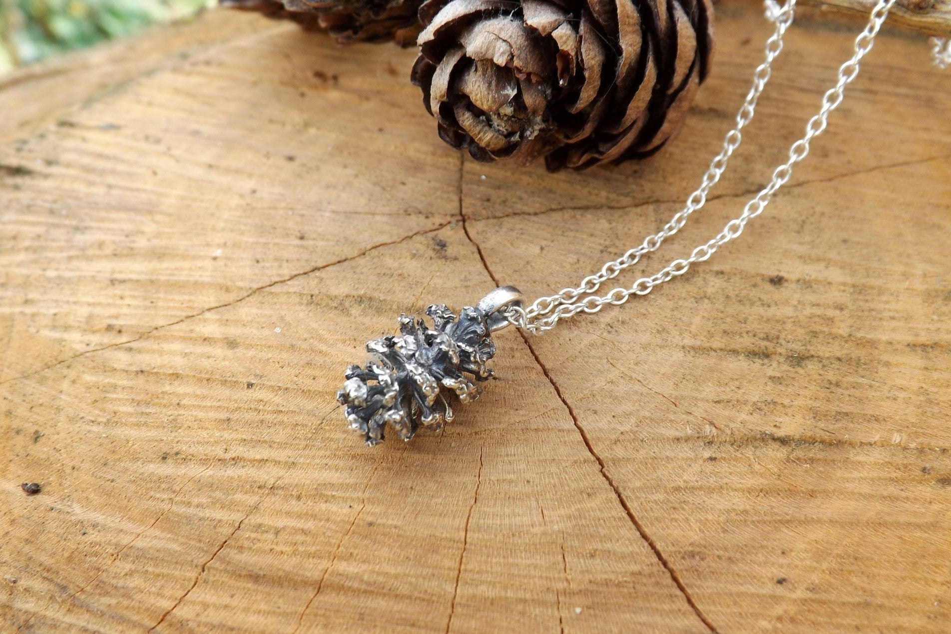 Silver pinecone necklace deals